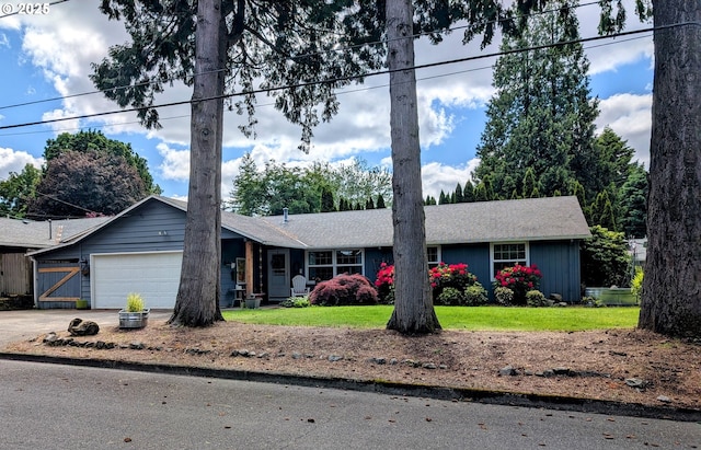 695 NW Towle Ave, Gresham, OR 97030 - ranch-style house featuring a garage, driveway, and a front lawn