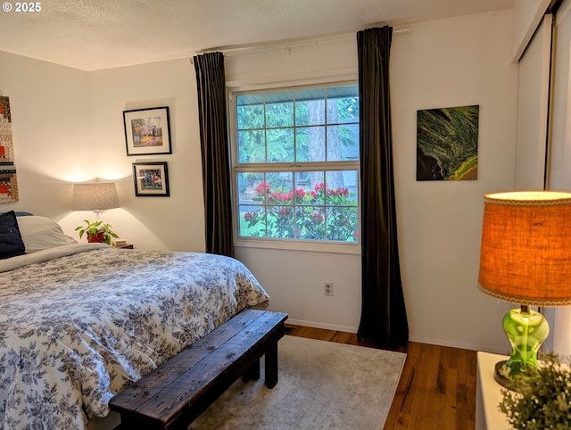 695 NW Towle Ave, Gresham, OR 97030 - bedroom with wood finished floors and baseboards