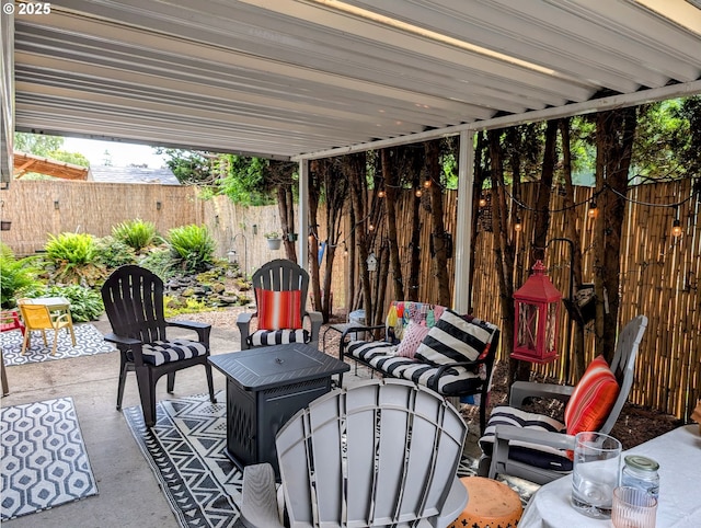 695 NW Towle Ave, Gresham, OR 97030 - fenced backyard with a patio and an outdoor hangout area