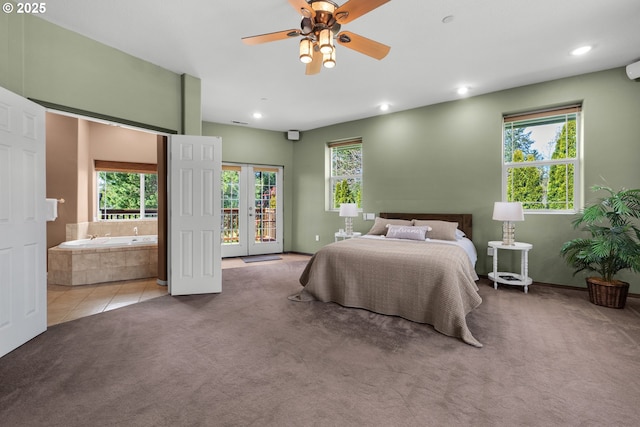 bedroom featuring connected bathroom, recessed lighting, access to outside, french doors, and carpet