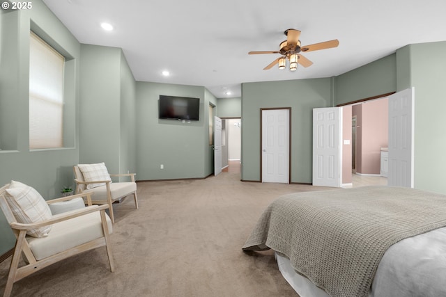 bedroom featuring light carpet, ceiling fan, baseboards, and recessed lighting