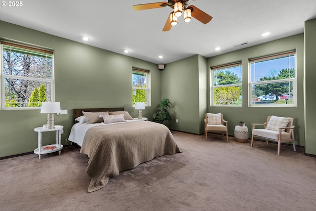 carpeted bedroom with a ceiling fan, recessed lighting, and baseboards