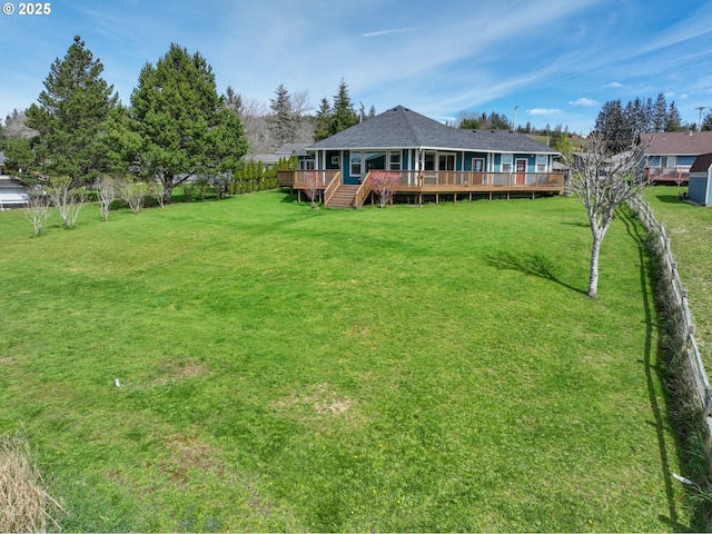 view of yard with a wooden deck