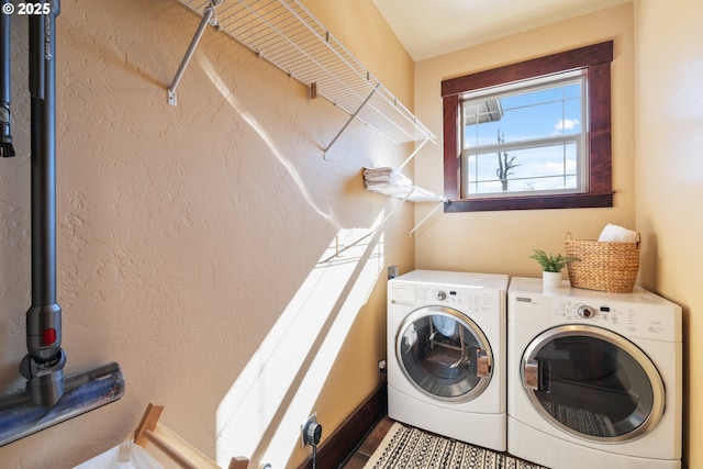 laundry room featuring laundry area and independent washer and dryer