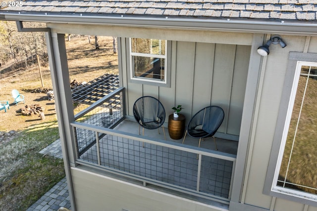 details with a shingled roof and board and batten siding