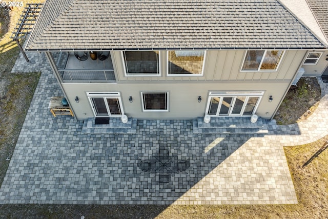 back of house featuring board and batten siding