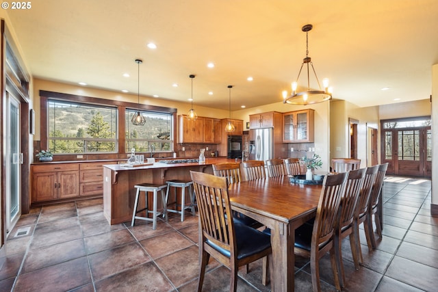 dining room with recessed lighting