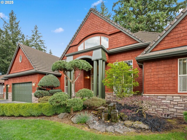 1303 NE 147th Ave, Vancouver, WA 98684 - view of front of property featuring an attached garage and stone siding