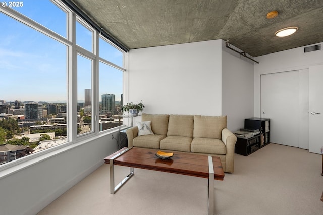 1926 W Burnside St Unit 1401, Portland, OR 97209 - carpeted living room with plenty of natural light and a view of city