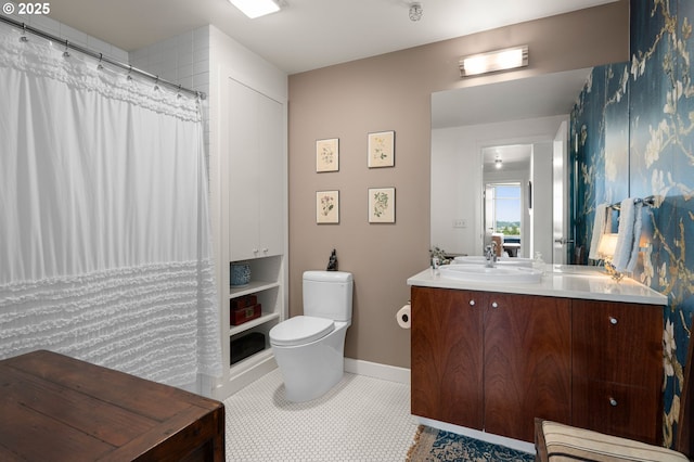 1926 W Burnside St Unit 1401, Portland, OR 97209 - full bathroom with toilet, vanity, baseboards, and curtained shower