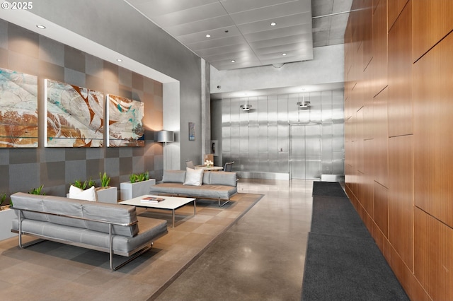 1926 W Burnside St Unit 1401, Portland, OR 97209 - building lobby featuring a towering ceiling and recessed lighting