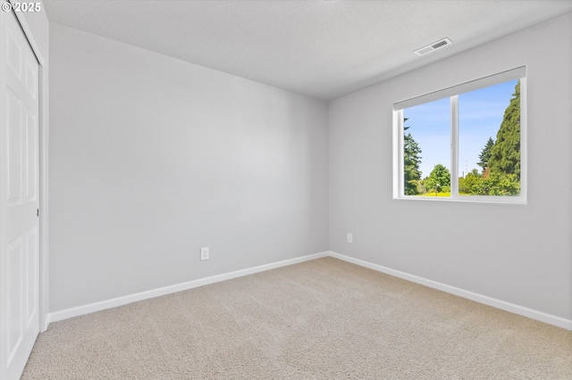 12800 Joys Dr, Oregon City, OR 97045 - unfurnished bedroom with carpet, baseboards, and a closet