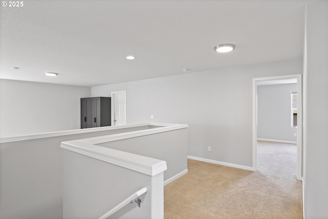 12800 Joys Dr, Oregon City, OR 97045 - corridor featuring light carpet, baseboards, and recessed lighting