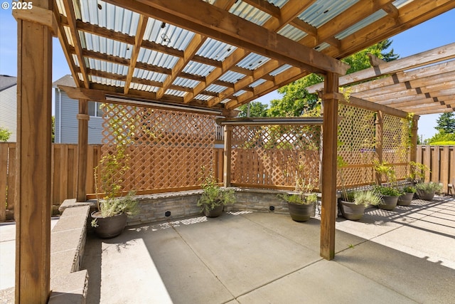 12800 Joys Dr, Oregon City, OR 97045 - fenced backyard with a pergola and a patio area