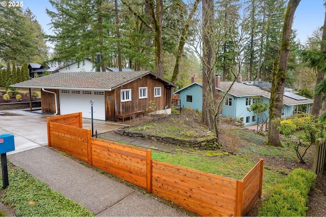 single story home with a garage