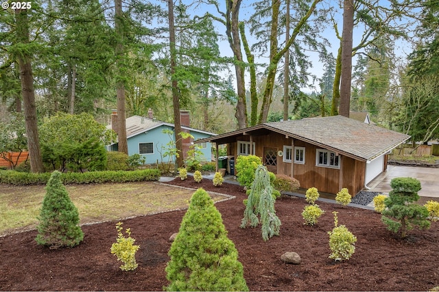 single story home featuring a garage