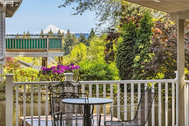 balcony featuring a mountain view