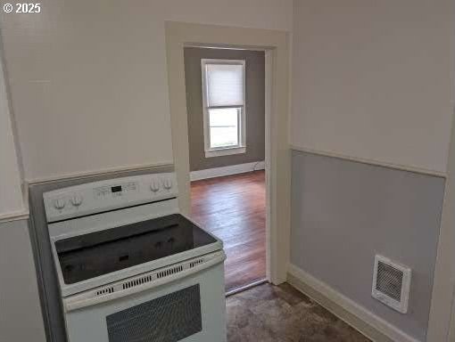 kitchen featuring electric range