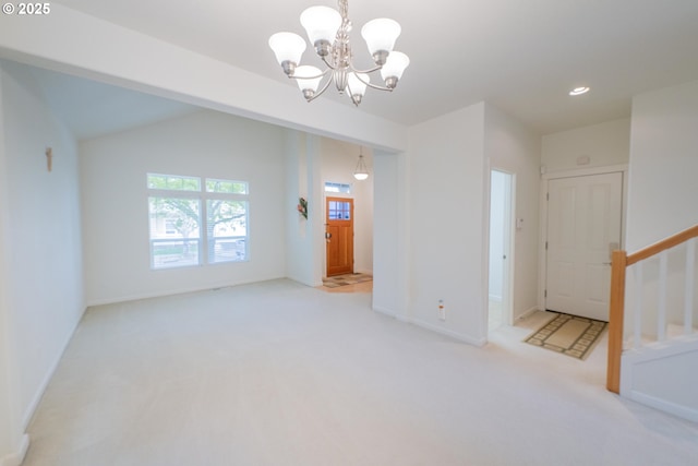 interior space featuring recessed lighting, carpet flooring, baseboards, and an inviting chandelier