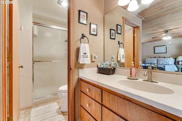 2407 Hawkins Ln, Eugene, OR 97405 - full bathroom featuring a shower stall, vanity, a ceiling fan, wood ceiling, and ensuite bath