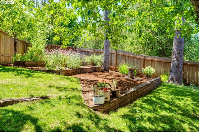 2407 Hawkins Ln, Eugene, OR 97405 - fenced backyard featuring a garden