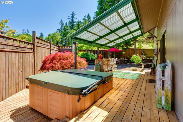 2407 Hawkins Ln, Eugene, OR 97405 - wooden deck featuring a covered hot tub and a fenced backyard