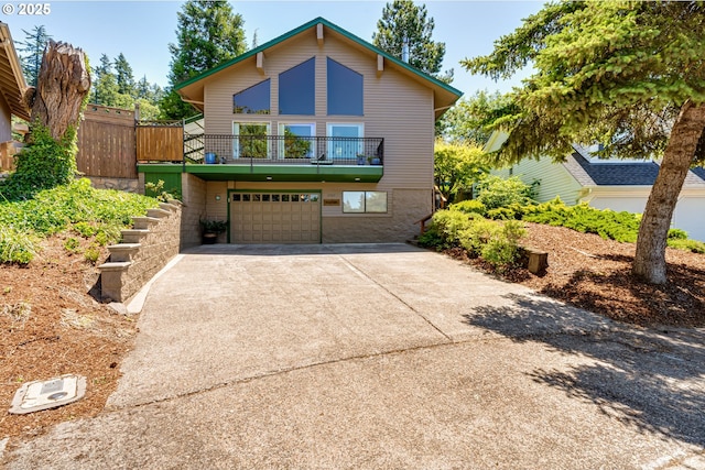 2407 Hawkins Ln, Eugene, OR 97405 - view of front of property featuring driveway, a garage, and a balcony