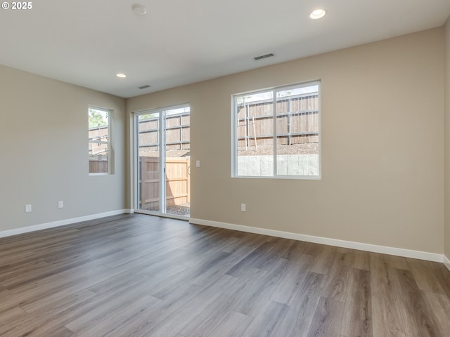 728 NW 178th Way, Ridgefield, WA 98642 - spare room with baseboards, recessed lighting, and wood finished floors