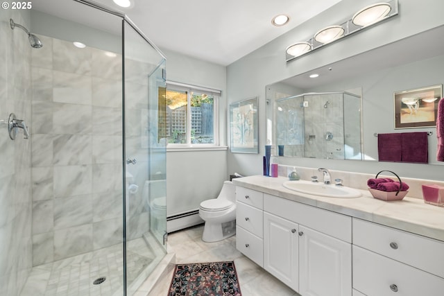 bathroom featuring baseboard heating, vanity, toilet, and an enclosed shower