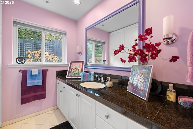 bathroom featuring vanity and tile patterned flooring