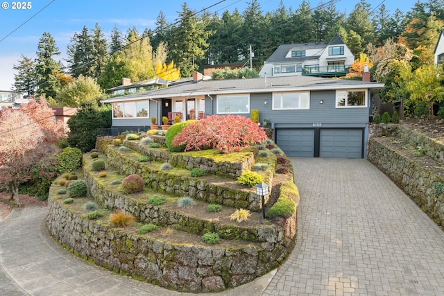 view of front of home with a garage