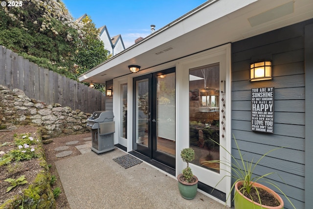 property entrance with french doors