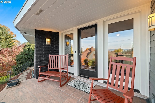 entrance to property with covered porch