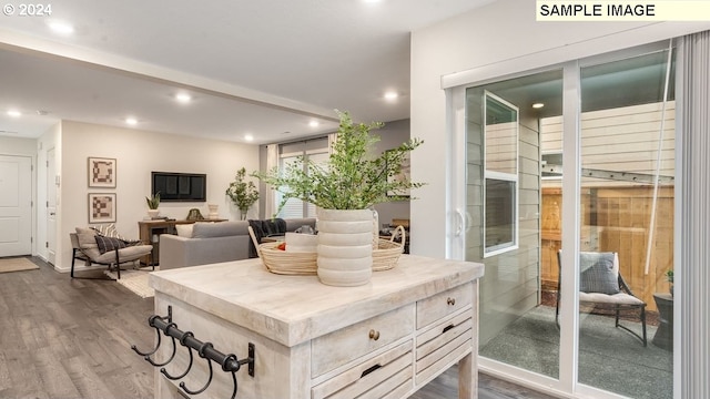 interior space featuring recessed lighting and dark wood-type flooring