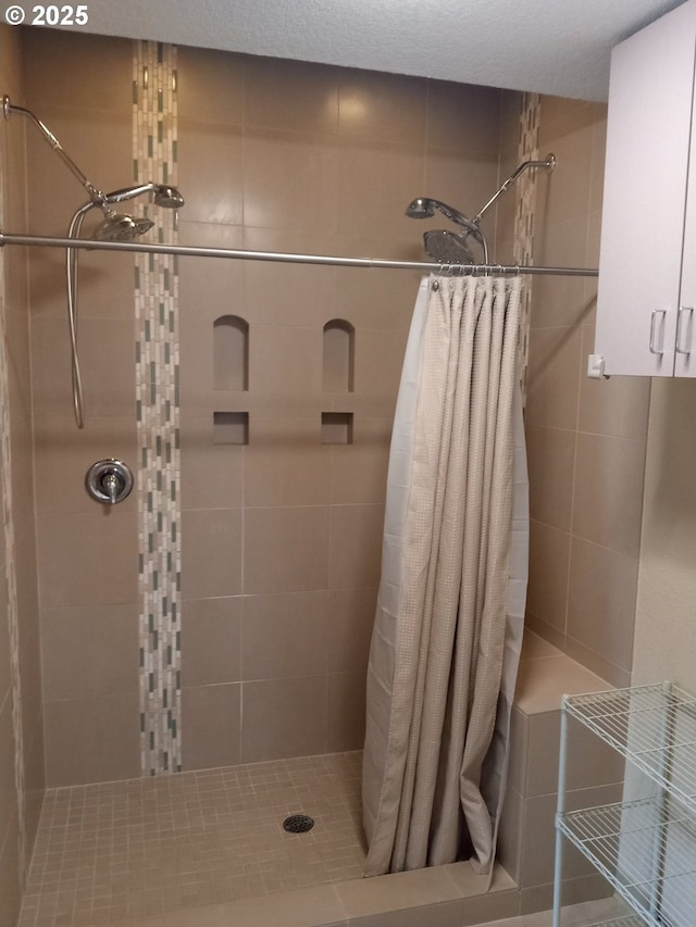 full bathroom featuring a shower stall