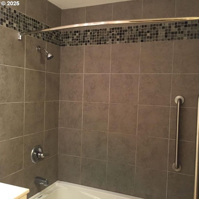 bathroom featuring washtub / shower combination