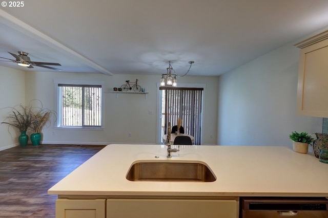 27 NW 6th Pl, Warrenton, OR 97146 - kitchen with dishwasher, dark wood finished floors, a sink, and light countertops