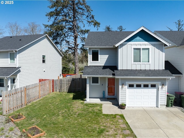 27 NW 6th Pl, Warrenton, OR 97146 - view of front of house with a front lawn, driveway, board and batten siding, fence, and roof with shingles