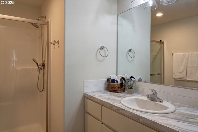 27 NW 6th Pl, Warrenton, OR 97146 - full bathroom with recessed lighting, vanity, and a stall shower
