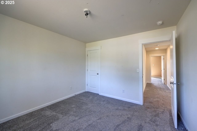 27 NW 6th Pl, Warrenton, OR 97146 - unfurnished bedroom with baseboards and carpet