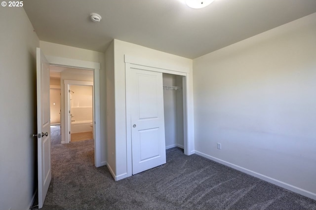 27 NW 6th Pl, Warrenton, OR 97146 - unfurnished bedroom featuring carpet, a closet, and baseboards