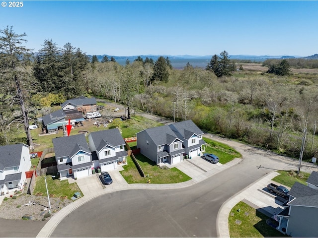 27 NW 6th Pl, Warrenton, OR 97146 - drone / aerial view with a view of trees and a residential view