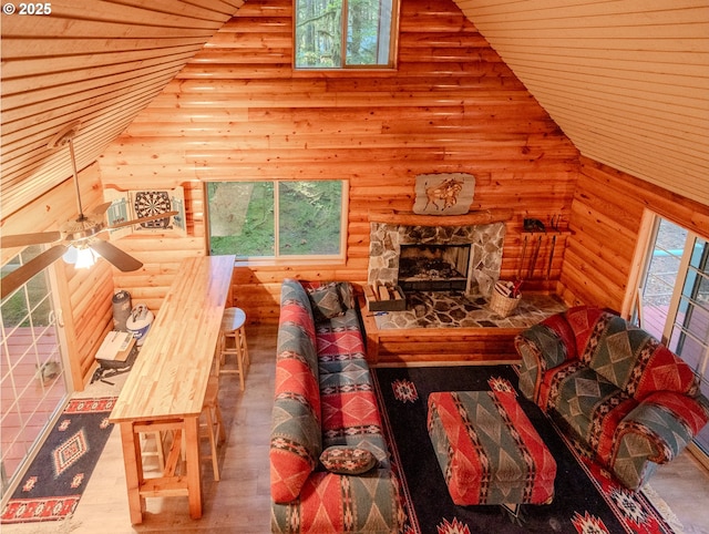 177 Northwoods, Cougar, WA 98616 - living area featuring high vaulted ceiling, log walls, wood finished floors, wood ceiling, and a ceiling fan