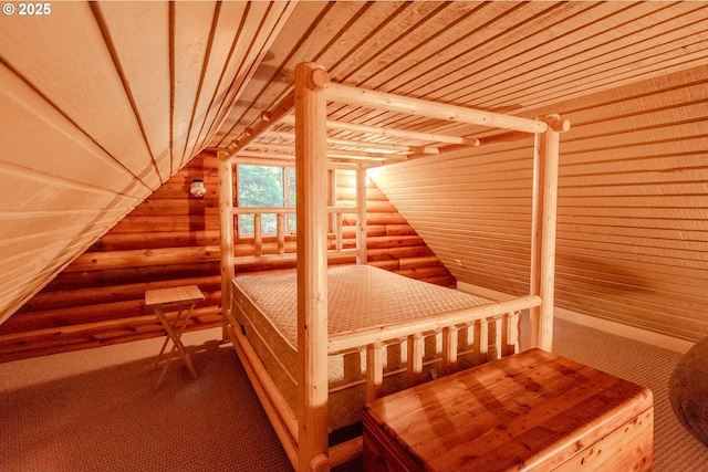 177 Northwoods, Cougar, WA 98616 - unfurnished bedroom with rustic walls, vaulted ceiling, and carpet floors