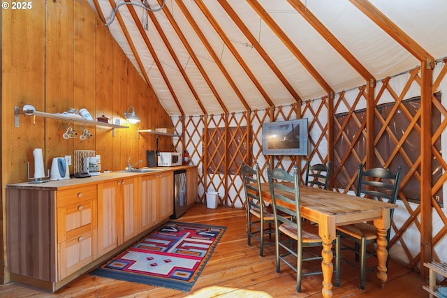 165 Stadelman Dr, Trout Lake, WA 98650 - unfurnished dining area with light wood-style floors, lofted ceiling, and wood walls