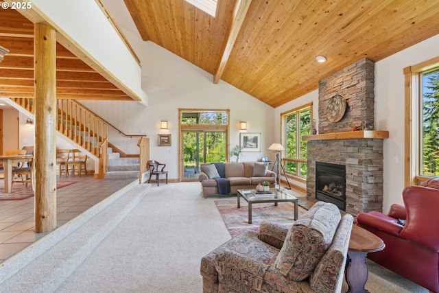 165 Stadelman Dr, Trout Lake, WA 98650 - carpeted living area featuring stairs, a stone fireplace, high vaulted ceiling, and a wooden ceiling with exposed beams