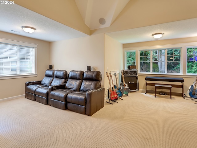 carpeted living room featuring vaulted ceiling