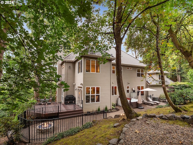 rear view of house with a patio area