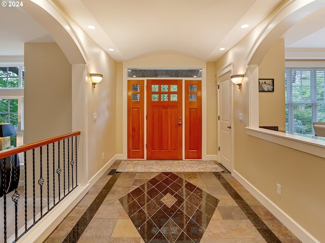 foyer with lofted ceiling