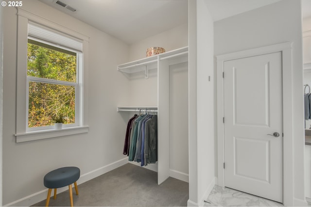 walk in closet featuring visible vents